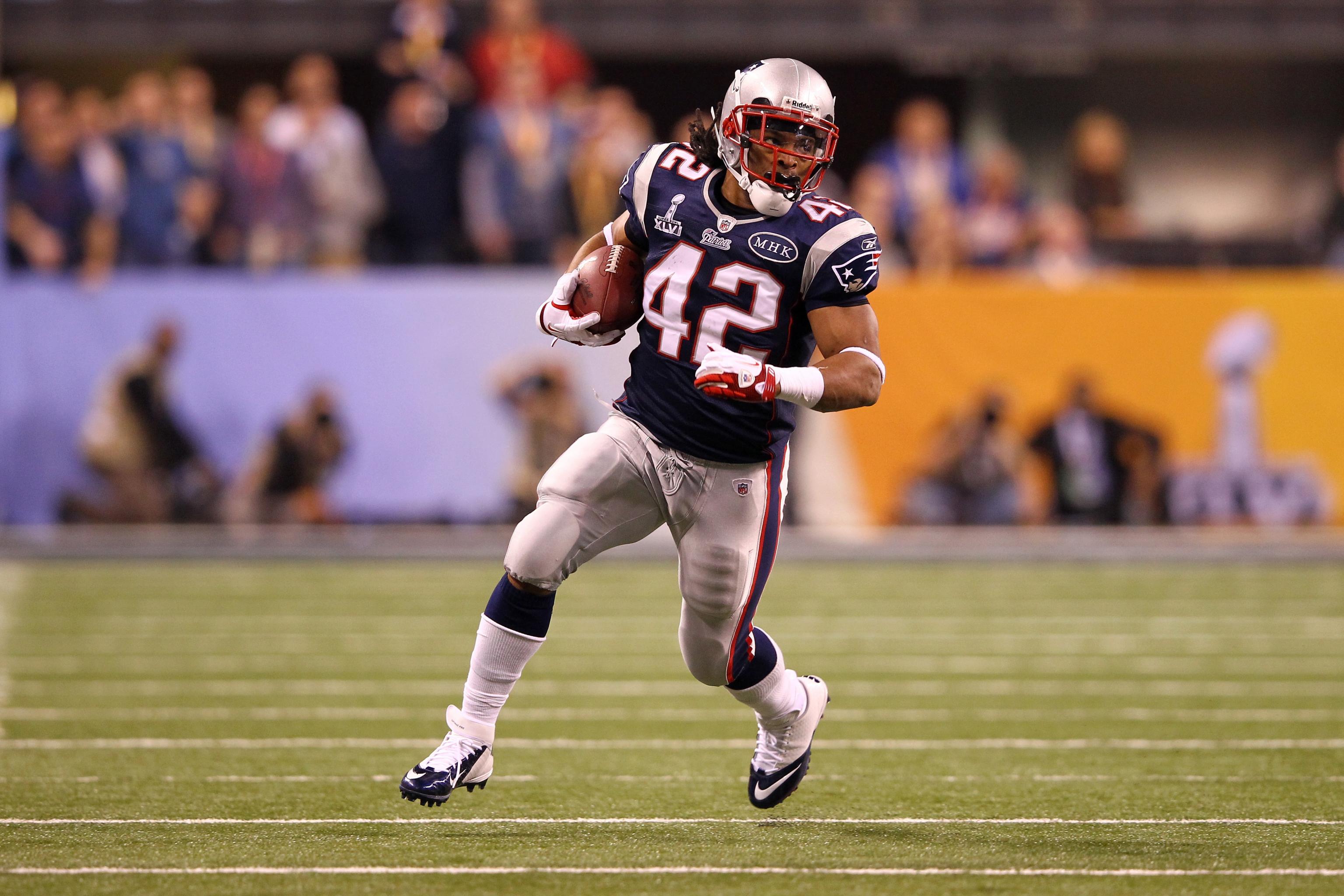 New England Patriots quarterback Tom Brady (12) gives a hug to running back  BenJarvus Green-Ellis after his13-yard touchdown carry in the third quarter  against the Minnesota Vikings at Gillette Stadium in Foxboro