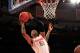 NEW YORK, NY - MARCH 09: Fab Melo #51 of the Syracuse Orange drives to the basket against the Cincinnati Bearcats during the semifinals of the Big East men's basketball tournament at Madison Square Garden on March 9, 2012 in New York City. (Photo by Chris Trotman/Getty Images)
