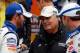 DAYTONA BEACH, FL - FEBRUARY 11: Jimmie Johnson (L), driver of the #48 Lowe's Chevrolet, talks with team owner Rick Hendrick (C) and crew chief Chad Knaus (R) in Victory Lane after winning the first NASCAR Sprint Cup Series Gatorade Duel at Daytona International Speedway on February 11, 2010 in Daytona Beach, Florida. (Photo by Jason Smith/Getty Images for NASCAR)