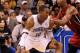ORLANDO, FL - MARCH 13: Dwight Howard #12 of the Orlando Magic is guarded by Chris Bosh #1 of the Miami Heat during the game at Amway Center on March 13, 2012 in Orlando, Florida. NOTE TO USER: User expressly acknowledges and agrees that, by downloading and or using this photograph, User is consenting to the terms and conditions of the Getty Images License Agreement. (Photo by Sam Greenwood/Getty Images)