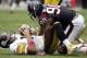HOUSTON - OCTOBER 02: Quarterback Ben Roethlisberger #17 of the Pittsburgh Steelers winces in pain after being sacked by outside linebacker Mario Williams #90 of the Houston Texans> at Reliant Stadium on October 2, 2011 in Houston, Texas. (Photo by Bob Levey/Getty Images)