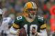 GREEN BAY, WI - JANUARY 01: Matt Flynn #10 of the Green Bay Packerslooks for a receiver against the Detroit Lions at Lambeau Field on January 1, 2012 in Green Bay, Wisconsin. The Packers defeated the Lions 45-41. (Photo by Jonathan Daniel/Getty Images)