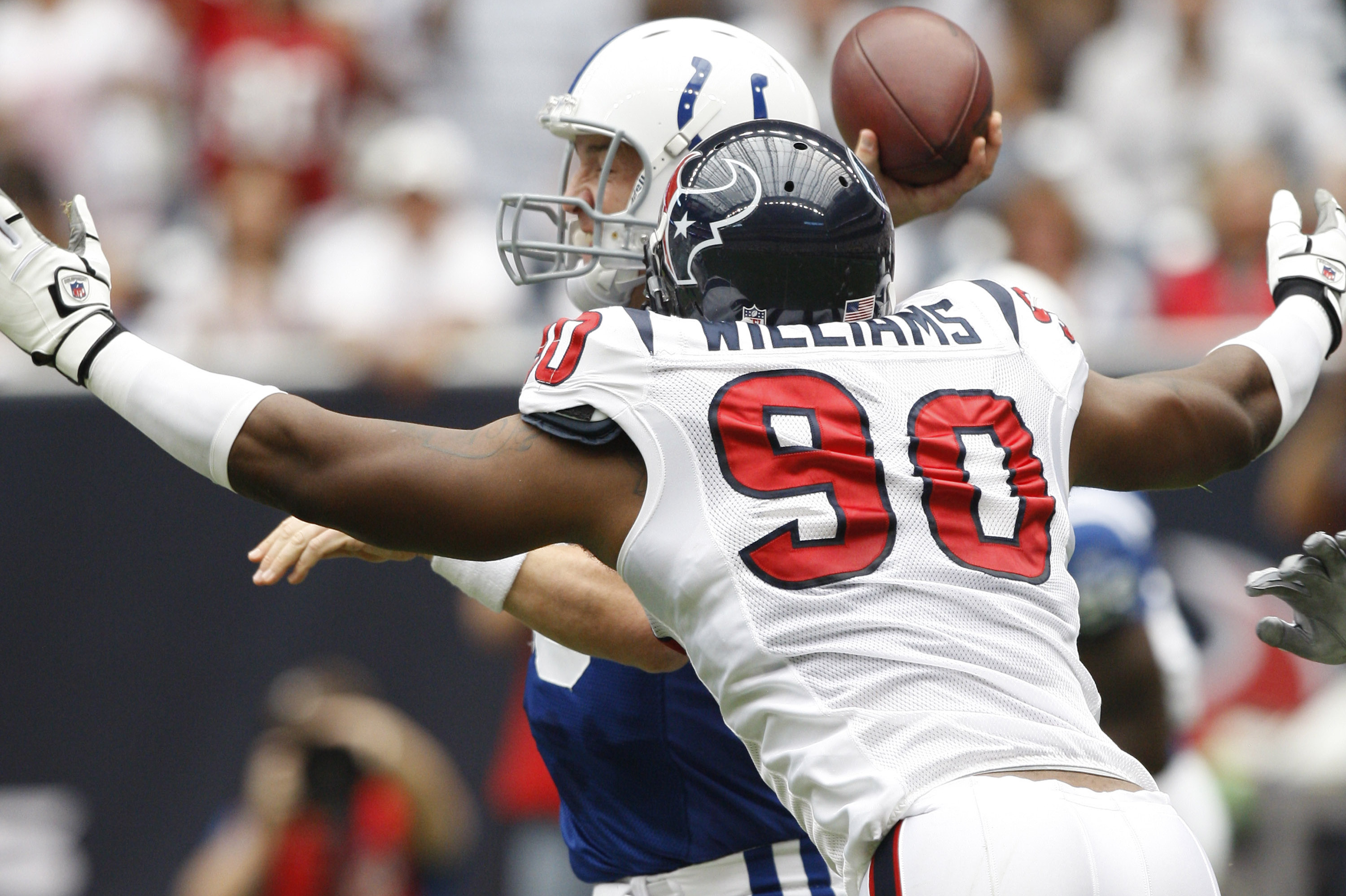 Buffalo Bills defensive end Mario Williams wears demonic red