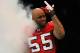 ATLANTA, GA - NOVEMBER 27: John Abraham #55 of the Atlanta Falcons enters the field during player introductions prior to facing the Minnesota Vikings at Georgia Dome on November 27, 2011 in Atlanta, Georgia. (Photo by Kevin C. Cox/Getty Images)