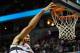 WASHINGTON, DC - FEBRUARY 22: JaVale McGee #34 of the Washington Wizards dunks over Jason Thompson #34 of the Sacramento Kings during the second half at Verizon Center on February 22, 2012 in Washington, DC. NOTE TO USER: User expressly acknowledges and agrees that, by downloading and or using this photograph, User is consenting to the terms and conditions of the Getty Images License Agreement. (Photo by Rob Carr/Getty Images)