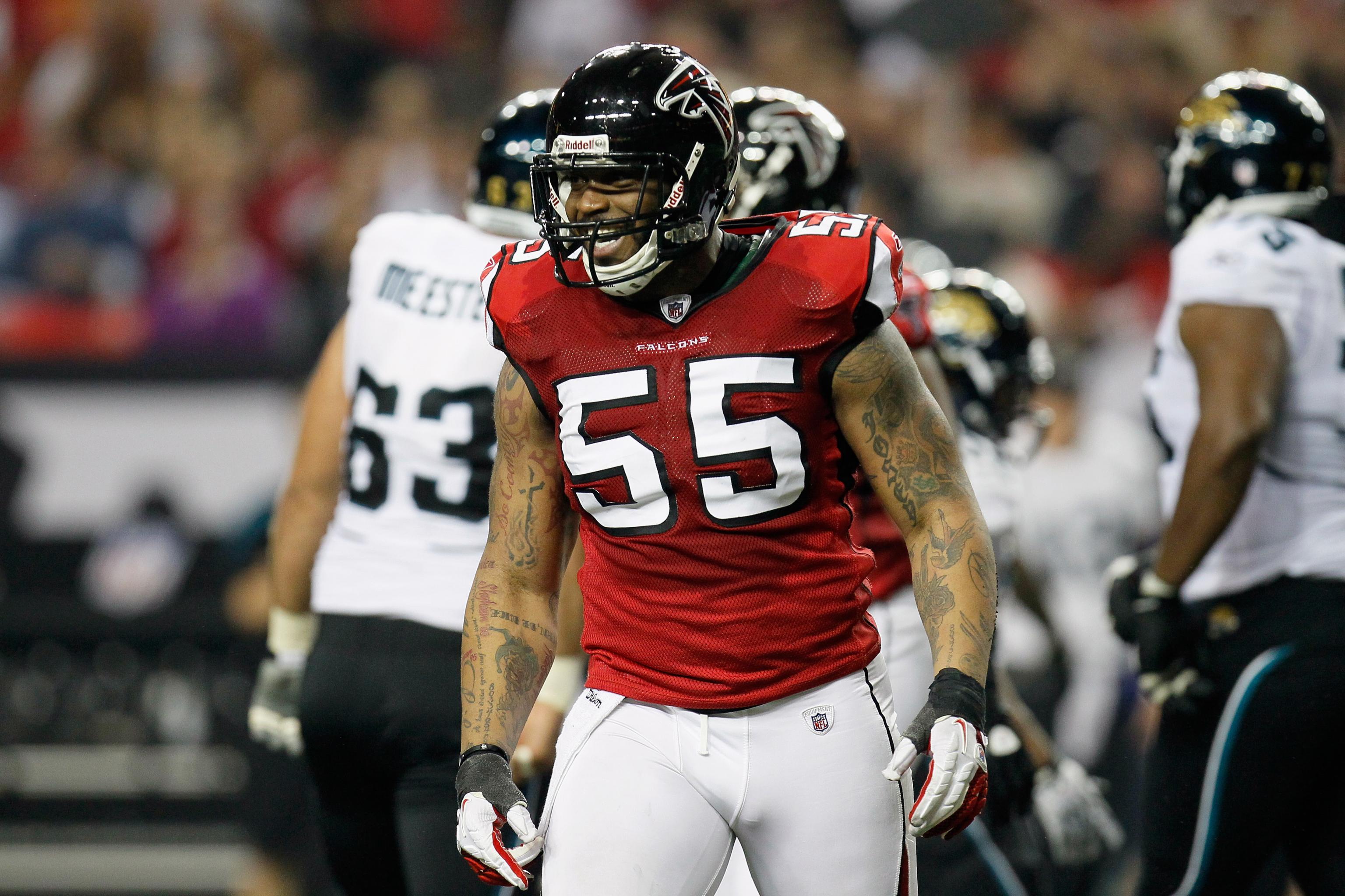 FILE ** Atlanta Falcons defensive end John Abraham goes through