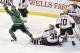 North Dakota's Mario Lamoureux celebrates his game-winning goal in the third period of the WCHA hockey tournament semi-finals.