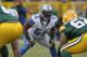 GREEN BAY, WI - JANUARY 01: Stephen Tulloch #55 of the Detroit Lions awaits the snap against the Green Bay Packers at Lambeau Field on January 1, 2012 in Green Bay, Wisconsin. The Packers defeated the Lions 45-41. (Photo by Jonathan Daniel/Getty Images)