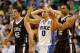 GREENSBORO, NC - MARCH 16: (C) Austin Rivers #0 of the Duke Blue Devils reacts as he stands between Gabe Knutson #42 and B.J. Bailey #32 of the Lehigh Mountain Hawks in the second half during the second round of the 2012 NCAA Men's Basketball Tournament at Greensboro Coliseum on March 16, 2012 in Greensboro, North Carolina. (Photo by Streeter Lecka/Getty Images)