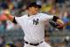 NEW YORK, NY - AUGUST 25: Phil Hughes #65 of the New York Yankees pitches against the Oakland Athletics at Yankee Stadium on August 25, 2011 at Yankee Stadium in the Bronx borough of New York City. (Photo by Chris Trotman/Getty Images)