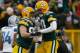 GREEN BAY, WI - JANUARY 1: Matt Flynn #10 of the Green Bay Packers celebrates a touchdown with Ryan Taylor #82 during the game against the Detroit Lions at Lambeau Field on January 1, 2012 in Green Bay, Wisconsin. (Photo by Scott Boehm/Getty Images)