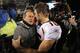 FOXBORO, MA - JANUARY 14: Tim Tebow #15 (R) of the Denver Broncos congraulates head coach Bill Belichick of the New England Patriots after the Patriots won 45-10 during their AFC Divisional Playoff Game at Gillette Stadium on January 14, 2012 in Foxboro, Massachusetts. (Photo by Jim Rogash/Getty Images)
