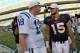 DENVER - SEPTEMBER 26: Quarterback Peyton Manning #18 of the Indianapolis Colts and quarterback Tim Tebow #15 of the Denver Broncos meet at midfield after the game at INVESCO Field at Mile High on September 26, 2010 in Denver, Colorado. The Colts defeated the Broncos 27-13 (Photo by Doug Pensinger/Getty Images)