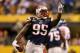 INDIANAPOLIS, IN - FEBRUARY 05: Defendsive end Mark Anderson #95 of the New England Patriots celebrates a play against the New York Giants in the first quarter during Super Bowl XLVI at Lucas Oil Stadium on February 5, 2012 in Indianapolis, Indiana. (Photo by Rob Carr/Getty Images)
