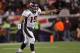 FOXBORO, MA - JANUARY 14: Tim Tebow #15 of the Denver Broncos reacts against the New England Patriots during their AFC Divisional Playoff Game at Gillette Stadium on January 14, 2012 in Foxboro, Massachusetts. (Photo by Jim Rogash/Getty Images)