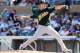 SCOTTSDALE, AZ - MARCH 09: Grant Balfour #50 of the Oakland Athletics delivers a pitch against the Colorado Rockies at Salt River Fields at Talking Stick on March 9, 2012 in Scottsdale, Arizona. (Photo by Norm Hall/Getty Images)