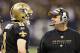NEW ORLEANS, LA - DECEMBER 26: Quarterback Drew Brees #9 and Head Coach Sean Payton of the New Orleans Saints talk on the sidelines during a game against the Atlanta Falcons at Mercedes-Benz Superdome on December 26, 2011 in New Orleans, Louisiana. The Saints defeated the Falcons 45-16. (Photo by Wesley Hitt/Getty Images)