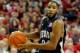 LAS VEGAS, NV - NOVEMBER 14: Deonte Burton #24 of the Nevada Reno Wolf Pack drives against the UNLV Rebels during their game at the Thomas & Mack Center November 14, 2011 in Las Vegas, Nevada. UNLV won 71-67. (Photo by Ethan Miller/Getty Images)