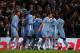 MANCHESTER, ENGLAND - MARCH 21: Samir Nasri of Manchester City (4th left) is mobbed by team mates as he scores their second goal during the Barclays Premier League match between Manchester City and Chelsea at the Etihad Stadium on March 21, 2012 in Manchester, England. (Photo by Alex Livesey/Getty Images)