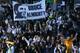 CARSON, CA - MARCH 18: Fans of the Los Angeles Galaxy hold up a banner for Head Coach Bruce Arena of the Los Angeles Galaxy after the MLS match between D.C. United and the Los Angeles Galaxy at The Home Depot Center on March 18, 2012 in Carson, California. The Galaxy defeated United 3-1. (Photo by Victor Decolongon/Getty Images)