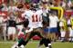 TAMPA, FL - AUGUST 27: Quarterback Josh Johnson #11 of the Tampa Bay Buccaneers throws a pass against the Miami Dolphins during a preseason game at Raymond James Stadium on August 27, 2011 in Tampa, Florida. (Photo by J. Meric/Getty Images)