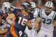 DENVER, CO - NOVEMBER 17: Quarterback Tim Tebow #15 of the Denver Broncos rushes against Eric Smith #33 of the New York Jets at Sports Authority Field at Mile High on November 17, 2011 in Denver, Colorado. The Broncos defeated the Jets 17-13. (Photo by Doug Pensinger/Getty Images)