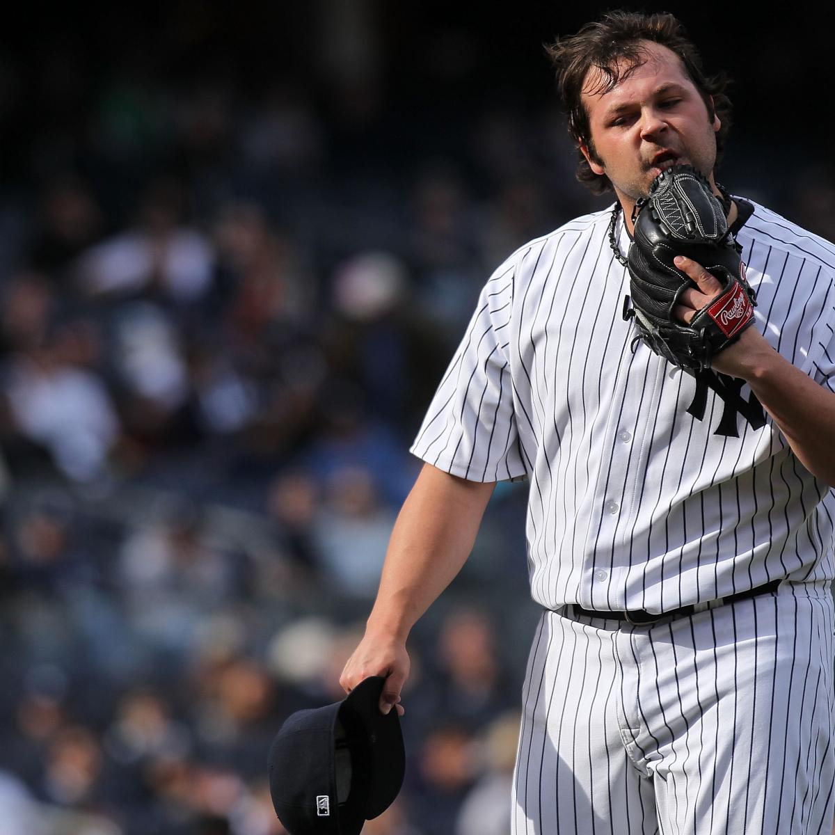 New York Yankees relief pitcher Joba Chamberlain reacts after a double play  ends the seventh inning against the Toronto Blue Jays at Yankee Stadium in  New York on Saturday, September 4, 2010.