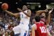 ATLANTA, GA - MARCH 23: Darius Miller #1 of the Kentucky Wildcats shoots past Christian Watford #2 and Will Sheehey #10 of the Indiana Hoosiers in the second half during the 2012 NCAA Men's Basketball South Regional Semifinal game at the Georgia Dome on March 23, 2012 in Atlanta, Georgia. The Kentucky Wildcats defeated the Indiana Hoosiers 102 to 90. (Photo by Kevin C. Cox/Getty Images)
