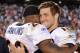 SAN DIEGO, CA - NOVEMBER 27: Tim Tebow #15 and Brian Dawkins #20 of the Denver Broncos celebrate a 16-13 overtime win over the San Diego Chargers at Qualcomm Stadium on November 27, 2011 in San Diego, California. (Photo by Harry How/Getty Images)