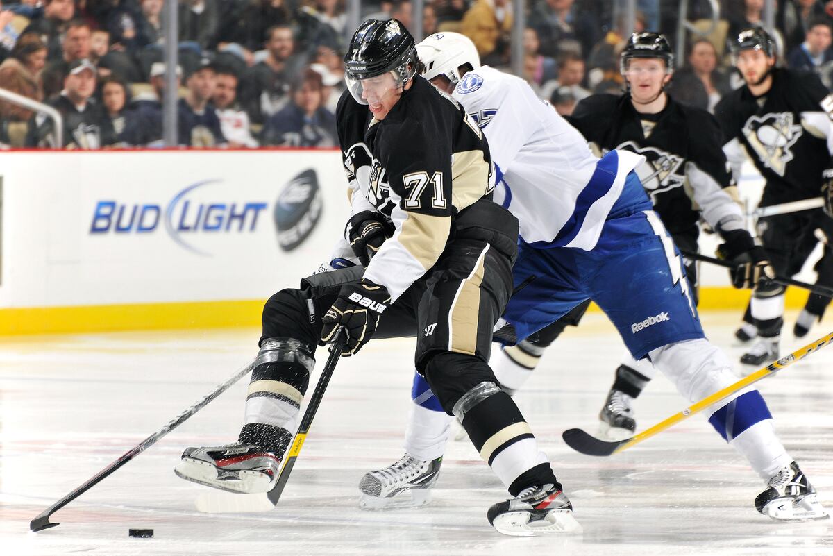 NHL Scoring Leaders Evgeni Malkin and Steven Stamkos Battling to the