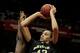 SAN ANTONIO - APRIL 04: Brittney Griner #42 of the Baylor Bears drives to the basket past Maya Moore #23 of the Connecticut Huskies in the first half during the Women's Final Four Semifinals at the Alamodome on April 4, 2010 in San Antonio, Texas. (Photo by Jeff Gross/Getty Images)