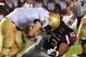 COLUMBIA, SC - SEPTEMBER 17: Defensive tackle Travian Robertson #42 of the South Carolina Gamecocks sacks quarterback Kriss Proctor #2 of Navy Midshipmen September 17, 2011 at Williams-Brice Stadium in Columbia, South Carolina. (Photo by Al Messerschmidt/Getty Images)