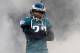 PHILADELPHIA, PA - NOVEMBER 27: Asante Samuel #22 of the Philadelphia Eagles takes the field through the smoke during player introductions against the New England Patriots at Lincoln Financial Field on November 27, 2011 in Philadelphia, Pennsylvania. (Photo by Patrick McDermott/Getty Images)