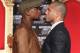 HOLLYWOOD, CA - MARCH 01: Floyd Mayweather and Miguel Cotto pose at a press conference to promote their upcoming fight on May 5 at the MGM Grand in Las Vegas at Grauman's Chinese Theatre on March 1, 2012 in Hollywood, California. (Photo by Jeff Gross/Getty Images)