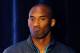 NEW YORK, NY - OCTOBER 04: Kobe Bryant listens as Derek Fisher, President of the National Basketball Players Association, speaks at a press conference after NBA labor negotiations at The Westin Times Square on October 4, 2011 in New York City. (Photo by Patrick McDermott/Getty Images)