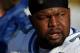 GREEN BAY, WI - DECEMBER 28: Gosder Cherilus #77 of the Detroit Lions listens on the bench as fans jeer his team during a game against the Green Bay Pacekrs on December 28, 2008 at Lambeau Field in Green Bay, Wisconsin. The Packers defeated the Lions 31-21. (Photo by Jonathan Daniel/Getty Images)