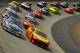 BRISTOL, TN - MARCH 18: Brian Vickers, driver of the #55 Aaron's Dream Machine Toyota, and A.J. Allmendinger, driver of the #22 Shell/Pennzoil Dodge, lead the field to a restart during the NASCAR Sprint Cup Series Food City 500 at Bristol Motor Speedway on March 18, 2012 in Bristol, Tennessee. (Photo by Justin Edmonds/Getty Images for NASCAR)