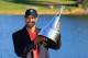 Tiger Woods hoists the trophy at the Arnold Palmer Invitational at Bay Hill, Florida