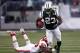EAST RUTHERFORD, NJ - DECEMBER 11: Shonn Greene #23 of the New York Jets runs away from Justin Houston #50 of the Kansas City Chiefs during their game at MetLife Stadium on December 11, 2011 in East Rutherford, New Jersey. (Photo by Jeff Zelevansky/Getty Images)