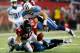 ATLANTA, GA - NOVEMBER 20: Tony Gonzalez #88 of the Atlanta Falcons fails to pull in this reception against Jordan Babineaux #26 and Colin McCarthy #52 of the Tennessee Titans at Georgia Dome on November 20, 2011 in Atlanta, Georgia. (Photo by Kevin C. Cox/Getty Images)