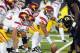 EUGENE, OR - NOVEMBER 19: Quarterback Matt Barkley #7 of the USC Trojans looks over the defense as Khaled Holmes #78 of the USC Trojans points out defenders in the fourth quarter of the game against the Oregon Ducks at Autzen Stadium on November 19, 2011 in Eugene, Oregon. USC won the game 38-35. (Photo by Steve Dykes/Getty Images)