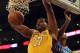 LOS ANGELES, CA - MARCH 29: Andrew Bynum #17 of the Los Angeles Lakers dunks past Kevin Durant #35 of the Oklahoma City Thunder at Staples Center on March 29, 2012 in Los Angeles, California. NOTE TO USER: User expressly acknowledges and agrees that, by downloading and or using this photograph, User is consenting to the terms and conditions of the Getty Images License Agreement. (Photo by Harry How/Getty Images)