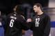 INDIANAPOLIS, IN - FEBRUARY 26: Quarterbacks Andrew Luck of Stanford and Robert Griffin III of Baylor meet during the 2012 NFL Combine at Lucas Oil Stadium on February 26, 2012 in Indianapolis, Indiana. (Photo by Joe Robbins/Getty Images)