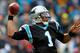 CHARLOTTE, NC - DECEMBER 24: Cam Newton #1 of the Carolina Panthers drops back to pass during their game against the Tampa Bay Buccaneers at Bank of America Stadium on December 24, 2011 in Charlotte, North Carolina. (Photo by Streeter Lecka/Getty Images)