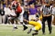 NEW ORLEANS, LA - JANUARY 09: Eddie Lacy #42 of the Alabama Crimson Tide runs with the ball against Brandon Taylor #18 of the Louisiana State University Tigers during the 2012 Allstate BCS National Championship Game at Mercedes-Benz Superdome on January 9, 2012 in New Orleans, Louisiana. (Photo by Ronald Martinez/Getty Images)
