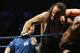 SYDNEY, AUSTRALIA - JUNE 15: The Undertaker (L) pushes Bam Neely into the corner during WWE Smackdown at Acer Arena on June 15, 2008 in Sydney, Australia. (Photo by Gaye Gerard/Getty Images)