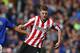LIVERPOOL, ENGLAND - MARCH 17: Nicklas Bendtner of Sunderland turns away from Sylvain Distin of Everton during the FA Cup Sixth Round match sponsored by Budweiser between Everton and Sunderland at Goodison Park on March 17, 2012 in Liverpool, England. (Photo by Alex Livesey/Getty Images)