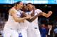 NEW ORLEANS, LA - APRIL 02: Eloy Vargas #30, Darius Miller #1, Anthony Davis #23 and Twany Beckham #10 of the Kentucky Wildcats celebrate defeating the Kansas Jayhawks 67-59 in the National Championship Game of the 2012 NCAA Division I Men's Basketball Tournament at the Mercedes-Benz Superdome on April 2, 2012 in New Orleans, Louisiana. (Photo by Jeff Gross/Getty Images)