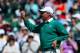 AUGUSTA, GA - APRIL 06: Fred Couples of the United States gestures to the gallery from the 18th green after finishing the second round of the 2012 Masters Tournament at Augusta National Golf Club on April 6, 2012 in Augusta, Georgia. (Photo by Andrew Redington/Getty Images)
