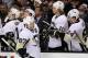 BOSTON, MA - APRIL 03: Sidney Crosby #87 of the Pittsburgh Penguins is congratulated by teammates Jordan Staal #11 and Matt Cooke #24 after Crosby scored in the first period against the Boston Bruins on April 3, 2012 at TD Garden in Boston, Massachusetts. (Photo by Elsa/Getty Images)